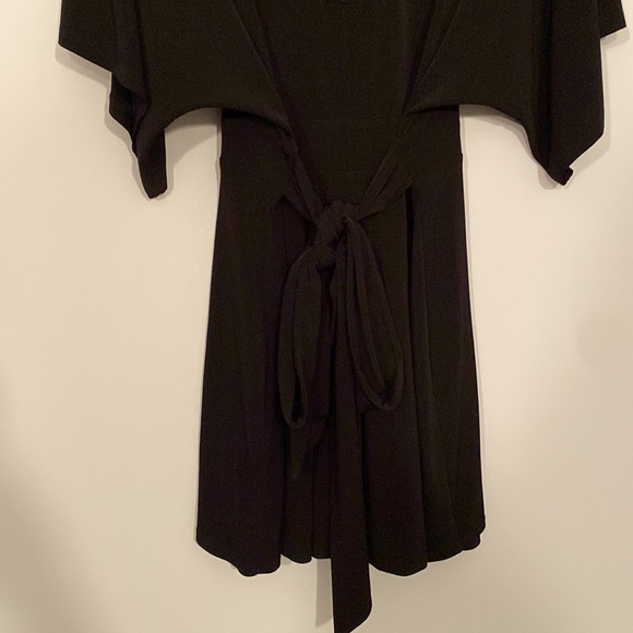 Express Short Shorts Romper w/ deep V neckline, open keyhole back & ties in back - Picture 7 of 8